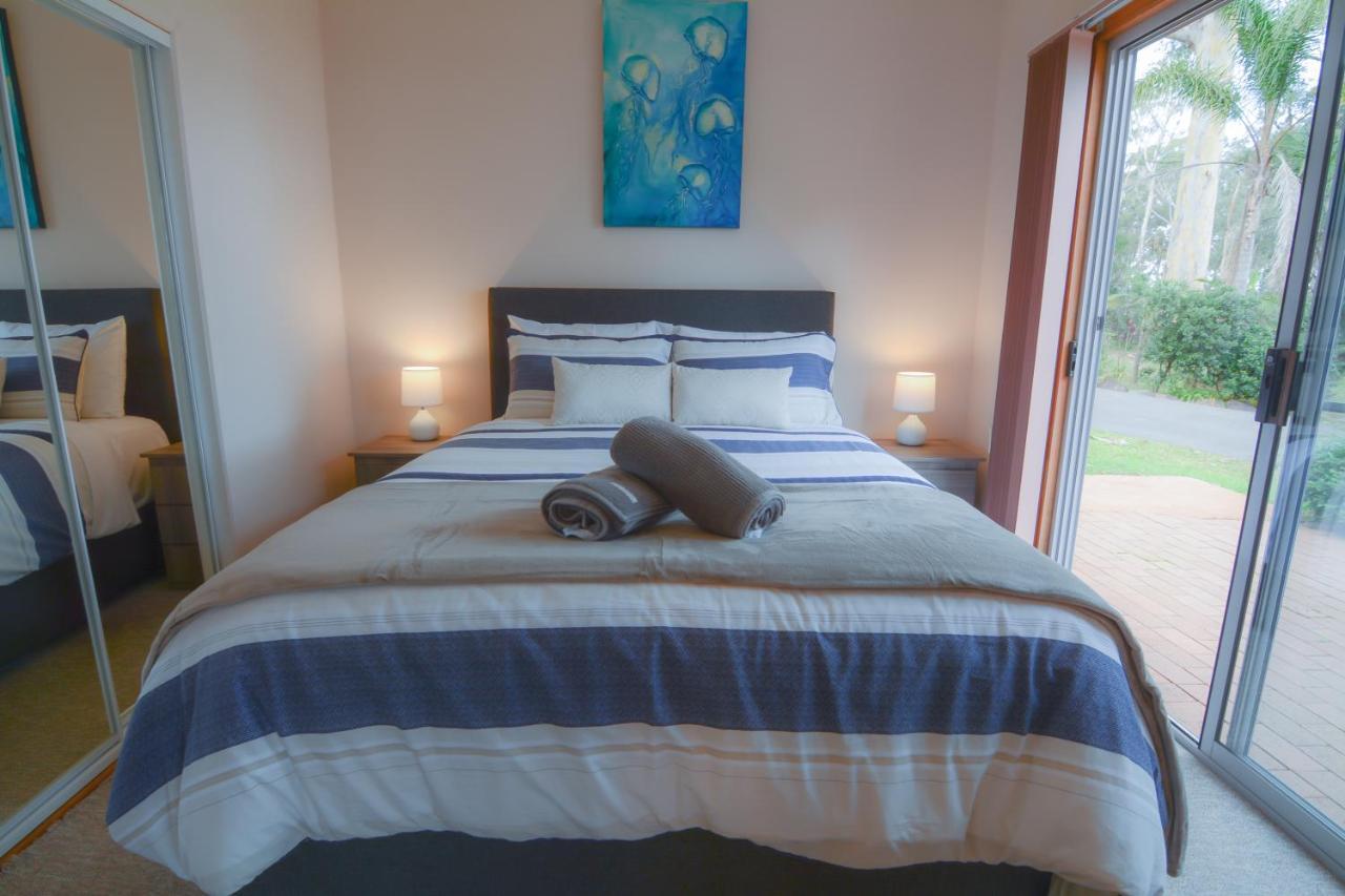 Quarantine Bay Beach Cottages Eden Bagian luar foto