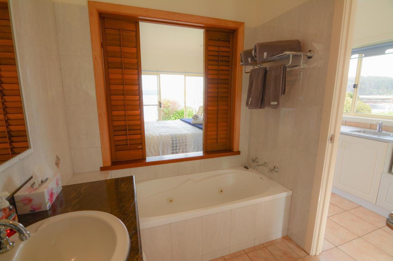Quarantine Bay Beach Cottages Eden Bagian luar foto