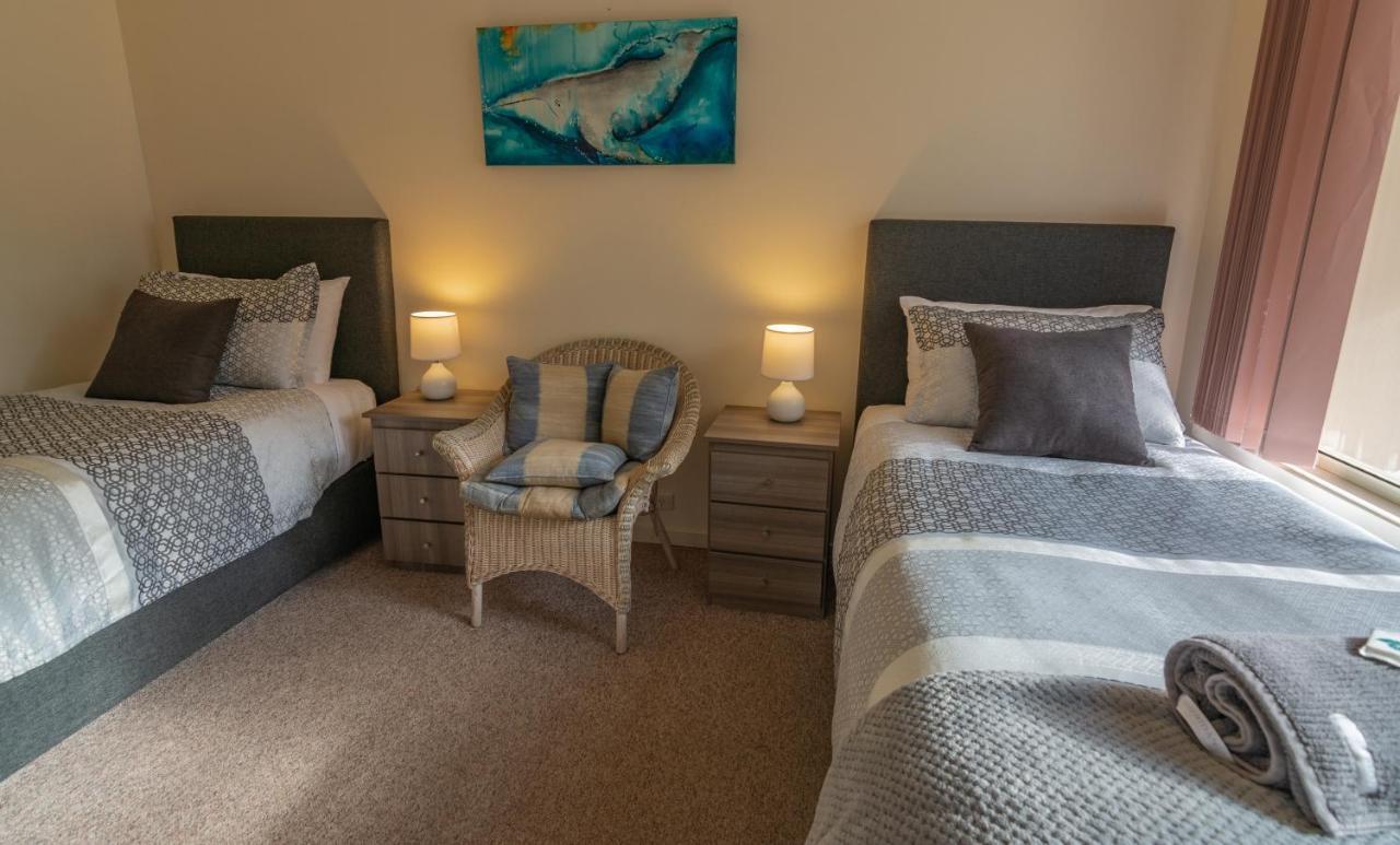 Quarantine Bay Beach Cottages Eden Bagian luar foto