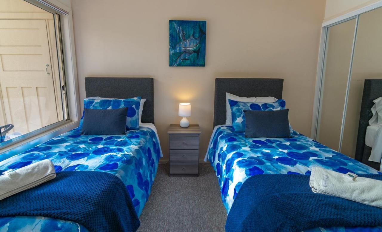 Quarantine Bay Beach Cottages Eden Bagian luar foto