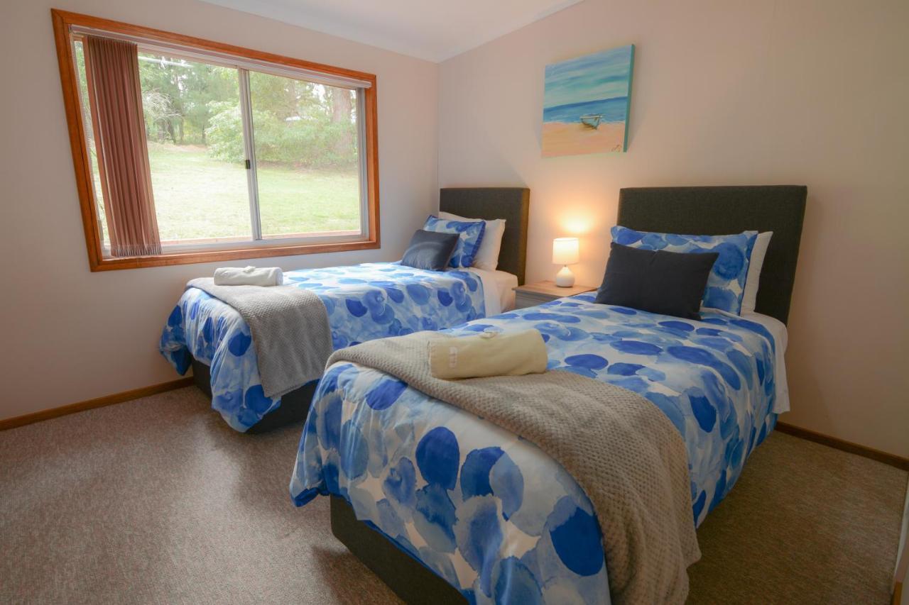 Quarantine Bay Beach Cottages Eden Bagian luar foto